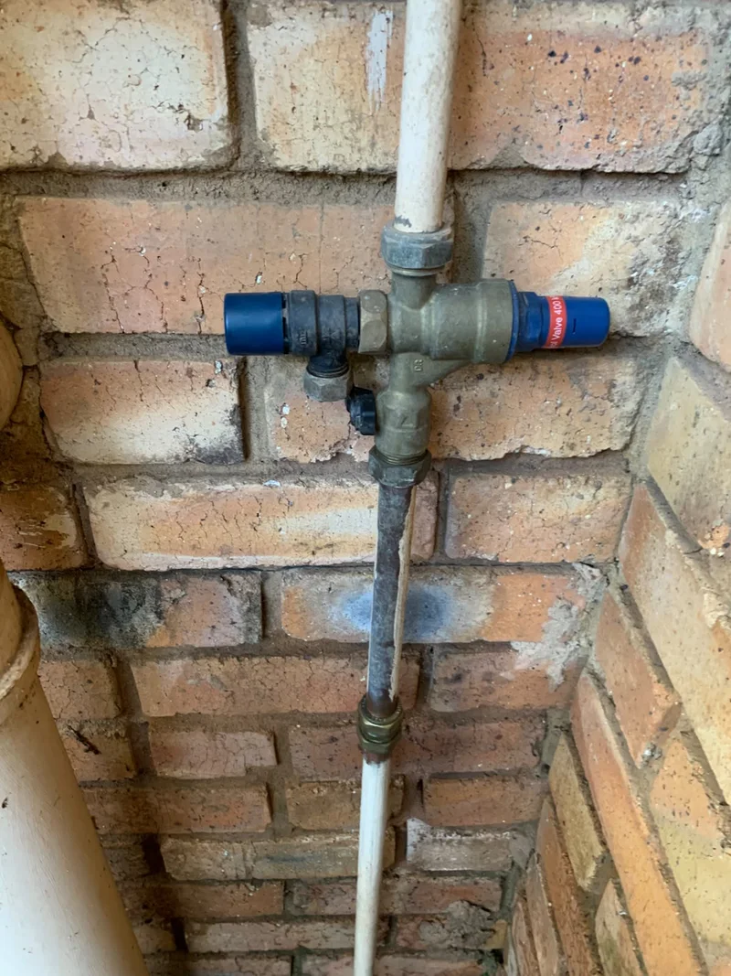 Photograph supplied by Muzee showing a pressure valve and pipework